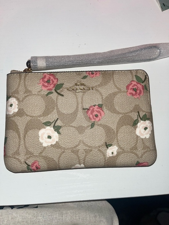 Coach Handbags - Coach Beige Signature Floral Zip Wristlet with Pink & Cream Flowers